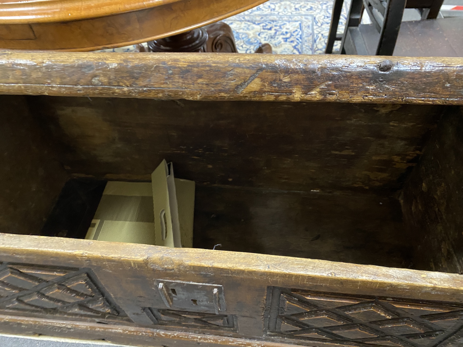 An 18th century Spanish carved walnut coffer, length 114cm, depth 49cm, height 47cm